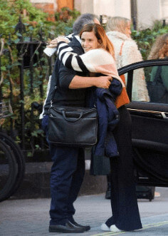 Chris is hugging his daughter Emma after lunch